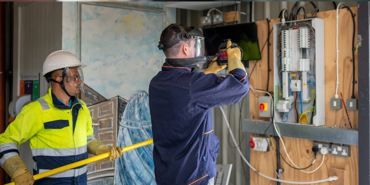 Drake Electrical Engineers carrying out a thermographic survey of an electrical distribution board
